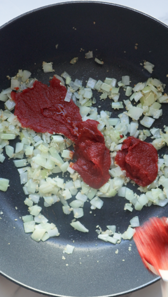 diced onion and garlic and tomato paste with the gulpea korma